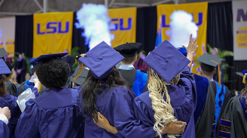 Fall 2025 Commencement Students celebrating the end of commencement