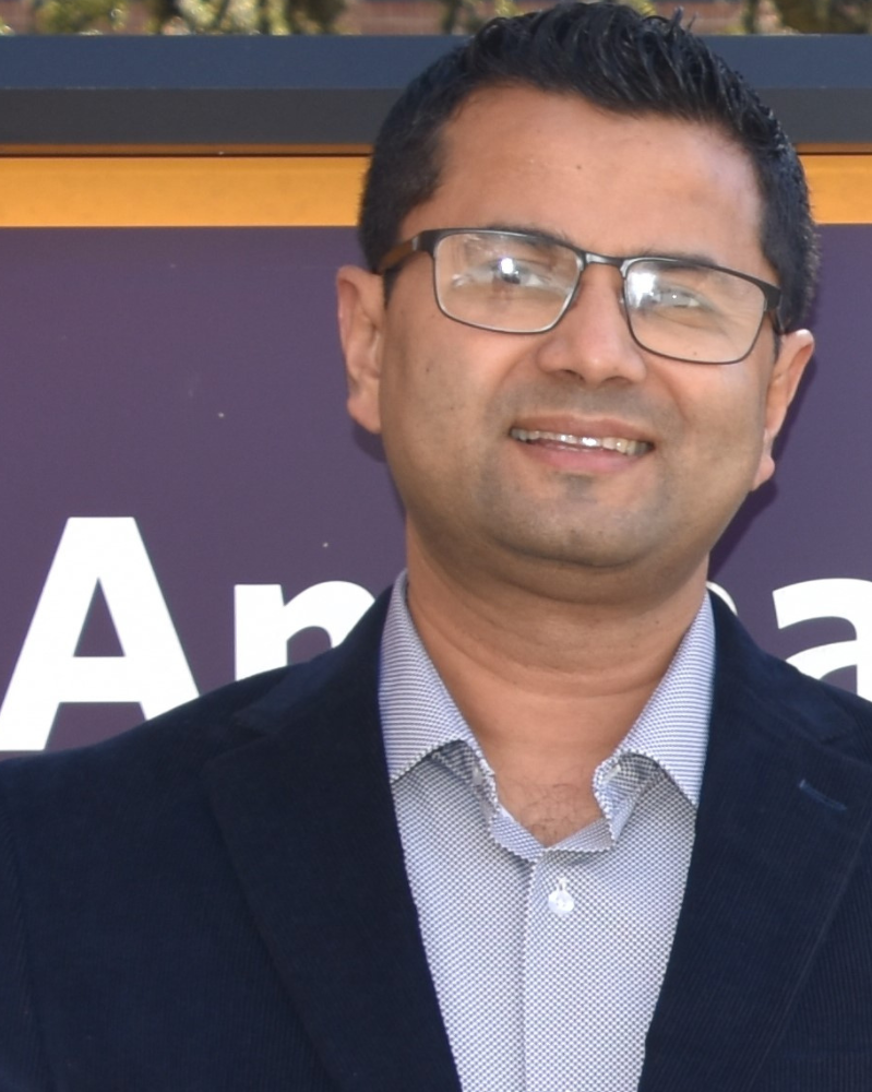 adhikari-headshot adhikari-headshot