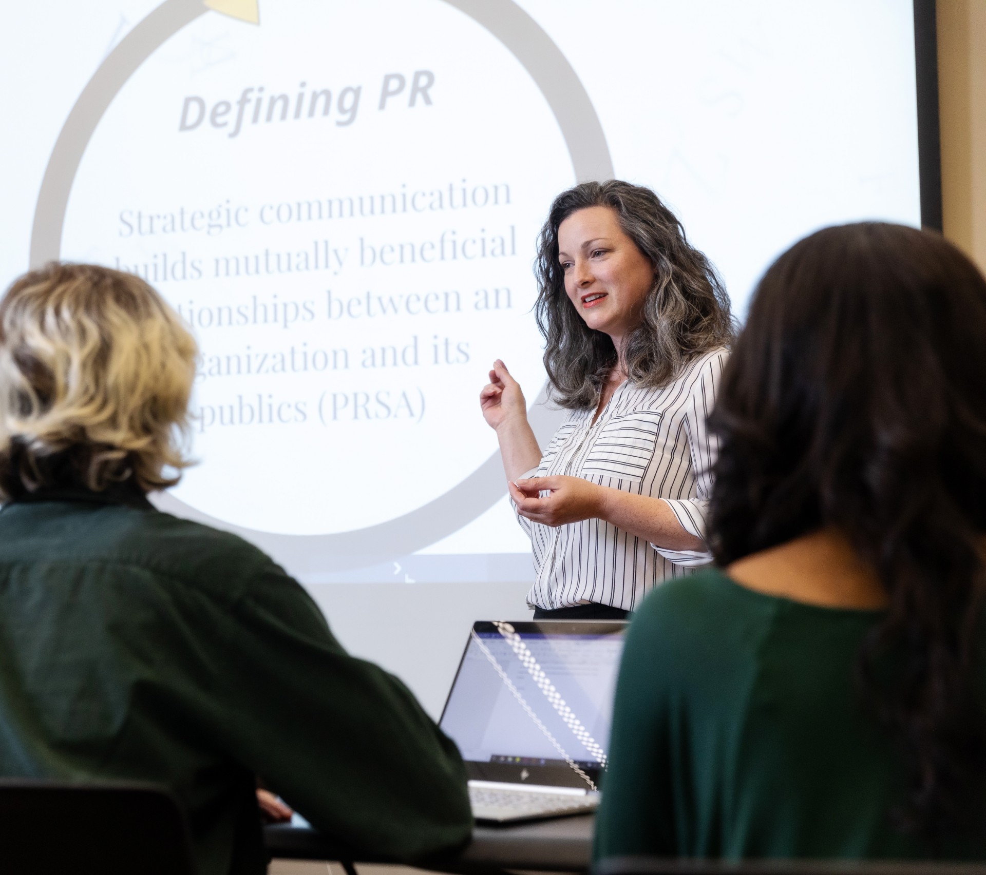 Teacher presenting to class