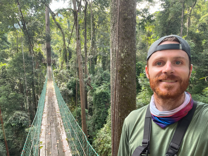 Austin Chipps in a wooded area
