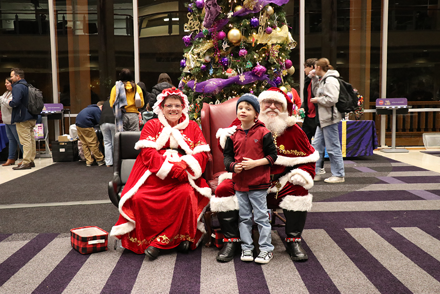 boy with Santa and Mrs. Claus