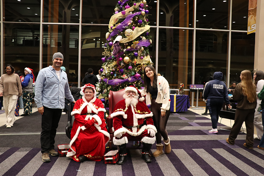 family with Santa and Mrs. Claus